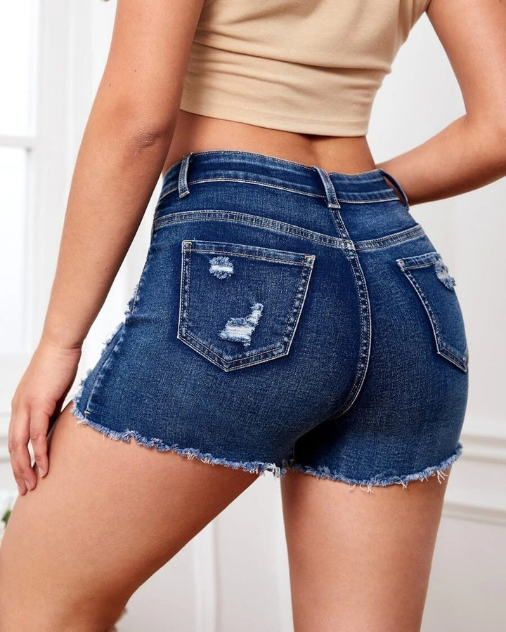 MALENEY MID RISE DISTRESS DENIM SHORTS